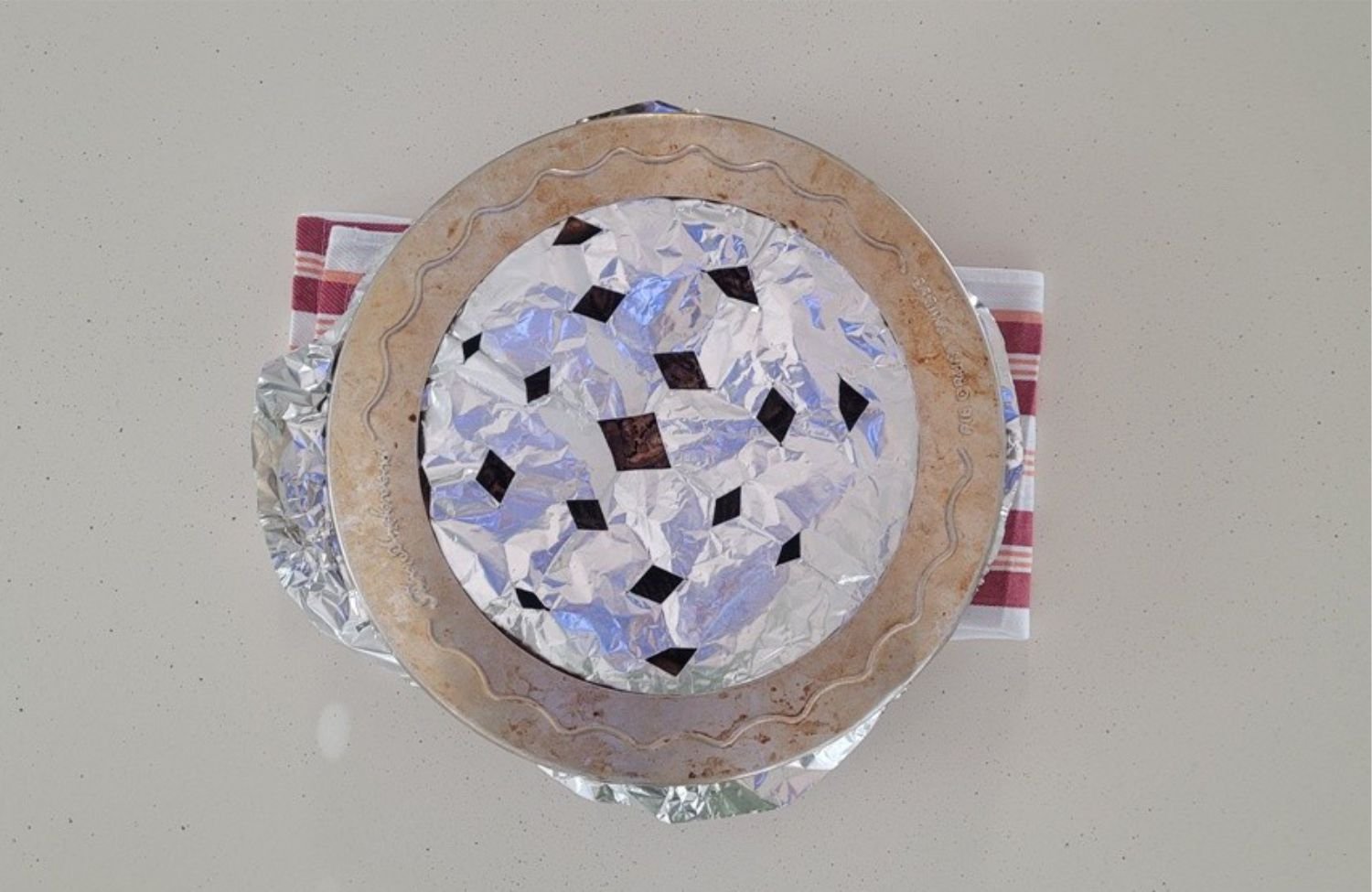 foil placed over top of pie to prevent pecans from burning