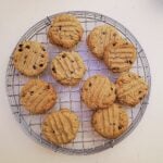 Overhead view of sunbutter cookies cooling on a wire rack