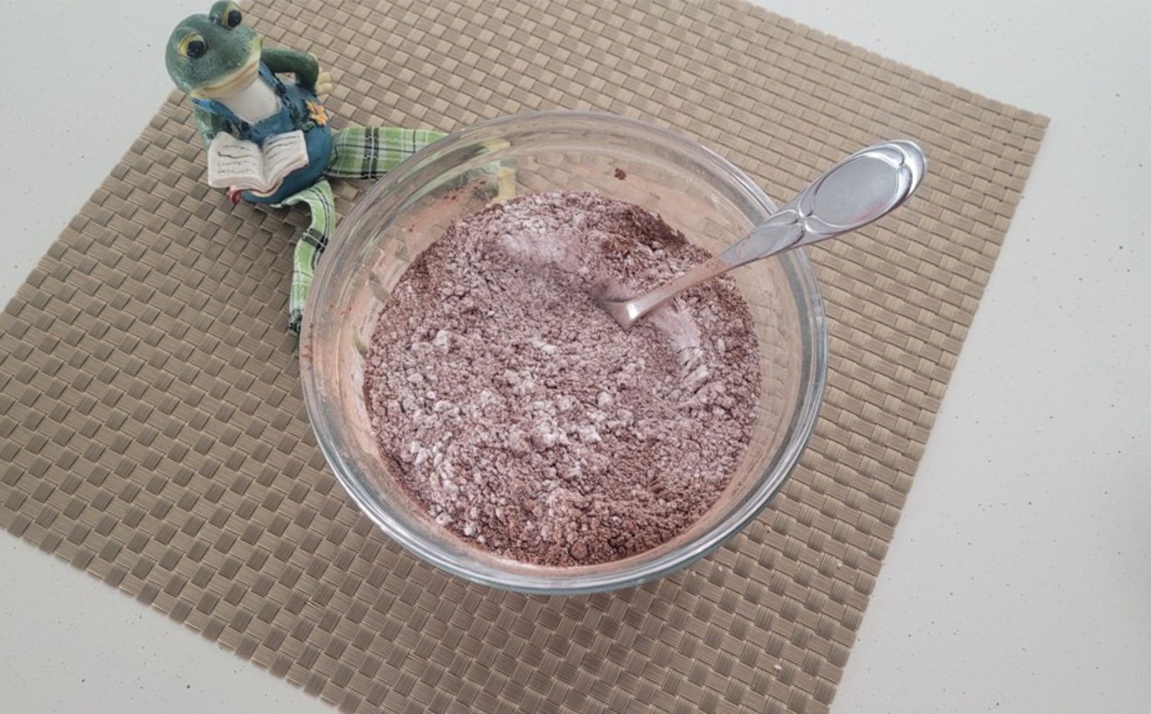 combined gluten free flour, cocoa powder and baking spices in a glass bowl