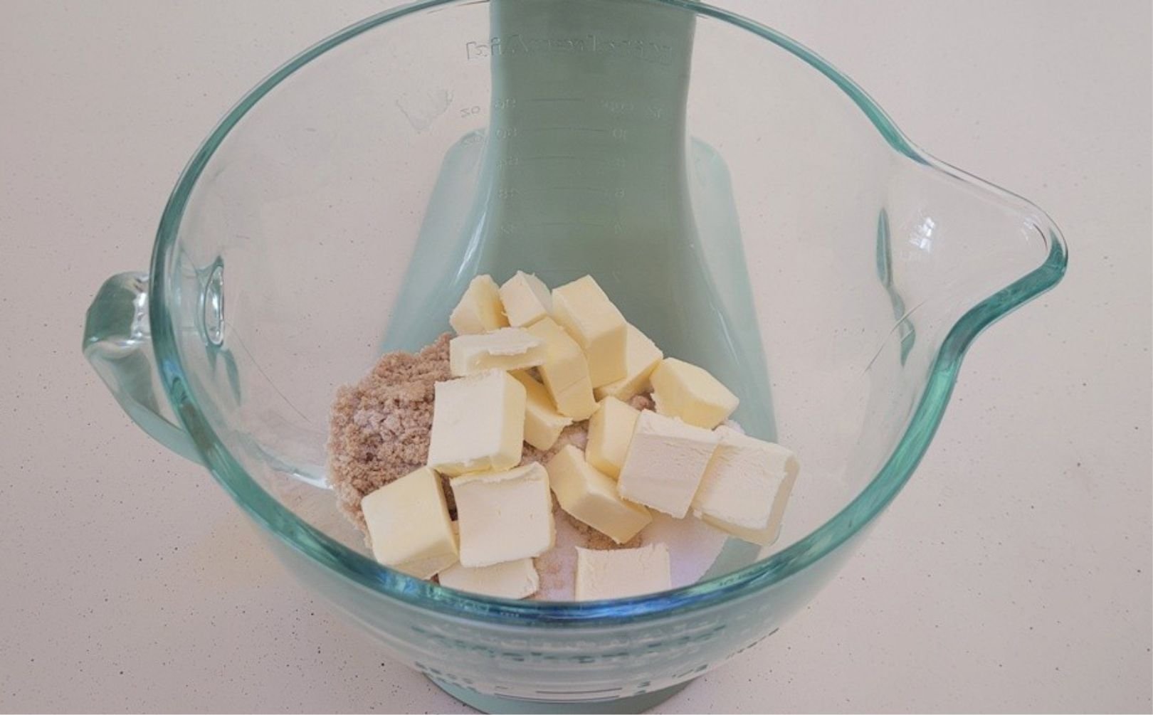 softened butter, brown sugar and granulated sugar in a glass mixing bowl