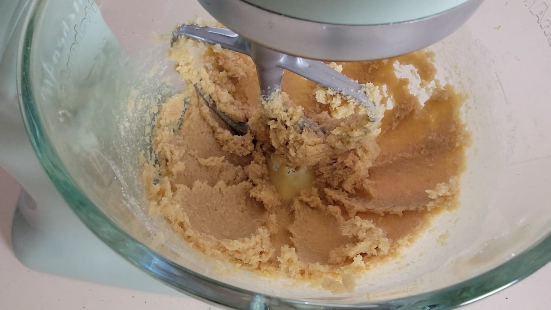 butter, brown sugar and granulated sugar creamed together in a mixing bowl