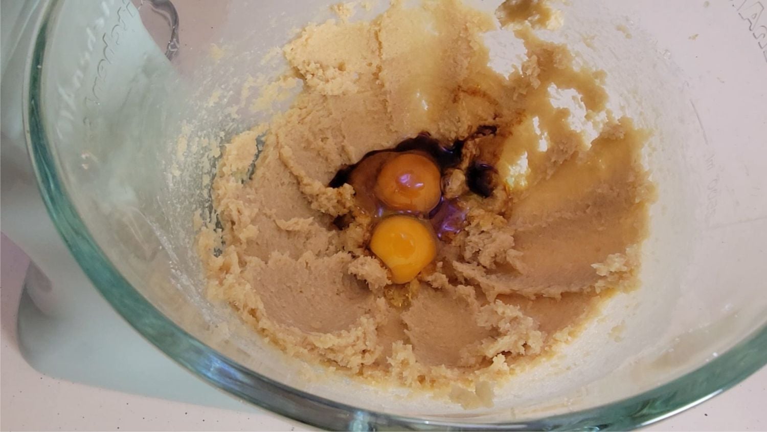 eggs and vanilla added to mixing bowl
