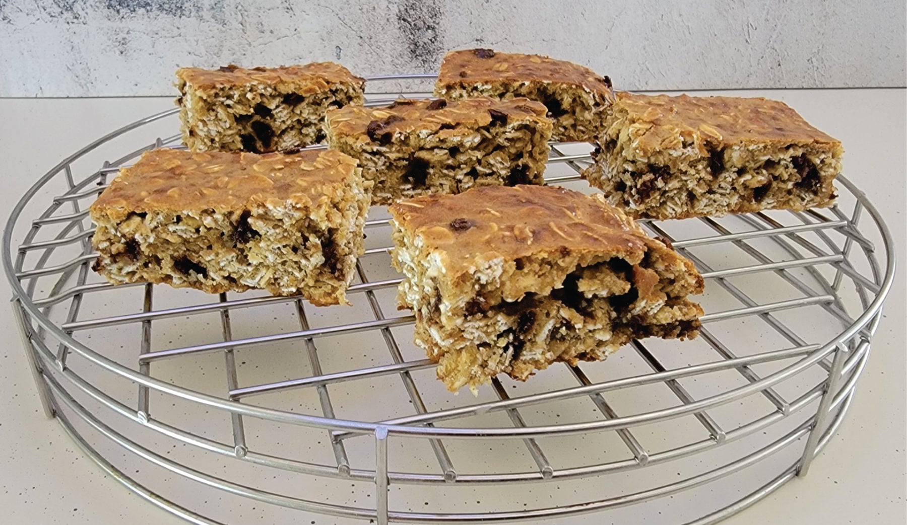 granola bars made with protein powder on a wire rack