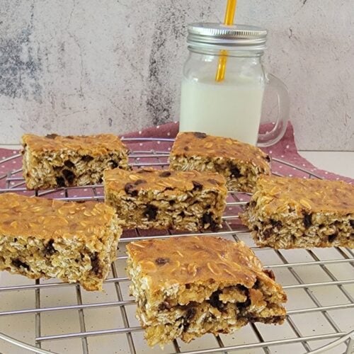 close up view of several homemade granola bars on a wire rack